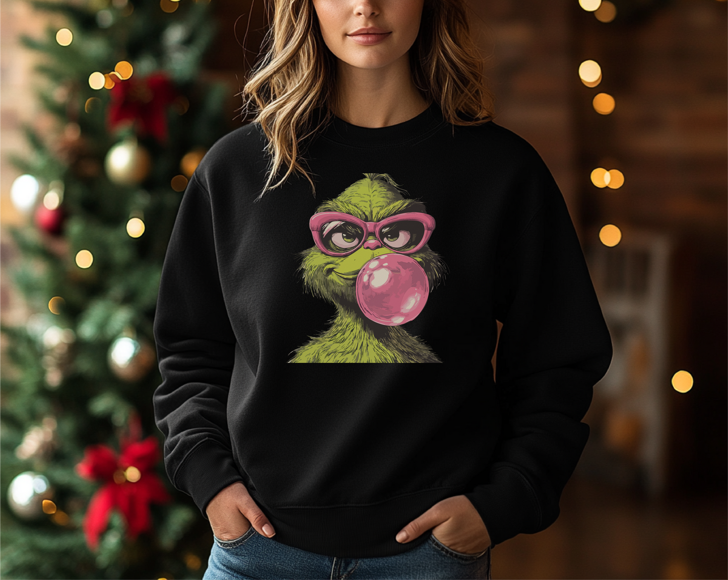 Retro Grinch Vibes design featuring the Grinch with pink glasses blowing a bubble on a black crewneck sweatshirt, perfect for festive holiday apparel.