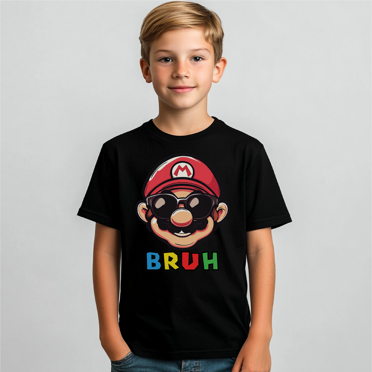 Super Bruh youth apparel featuring a retro-inspired character with sunglasses and vibrant 'BRUH' text. Available in toddler and youth sizes, shown on a black T-shirt.