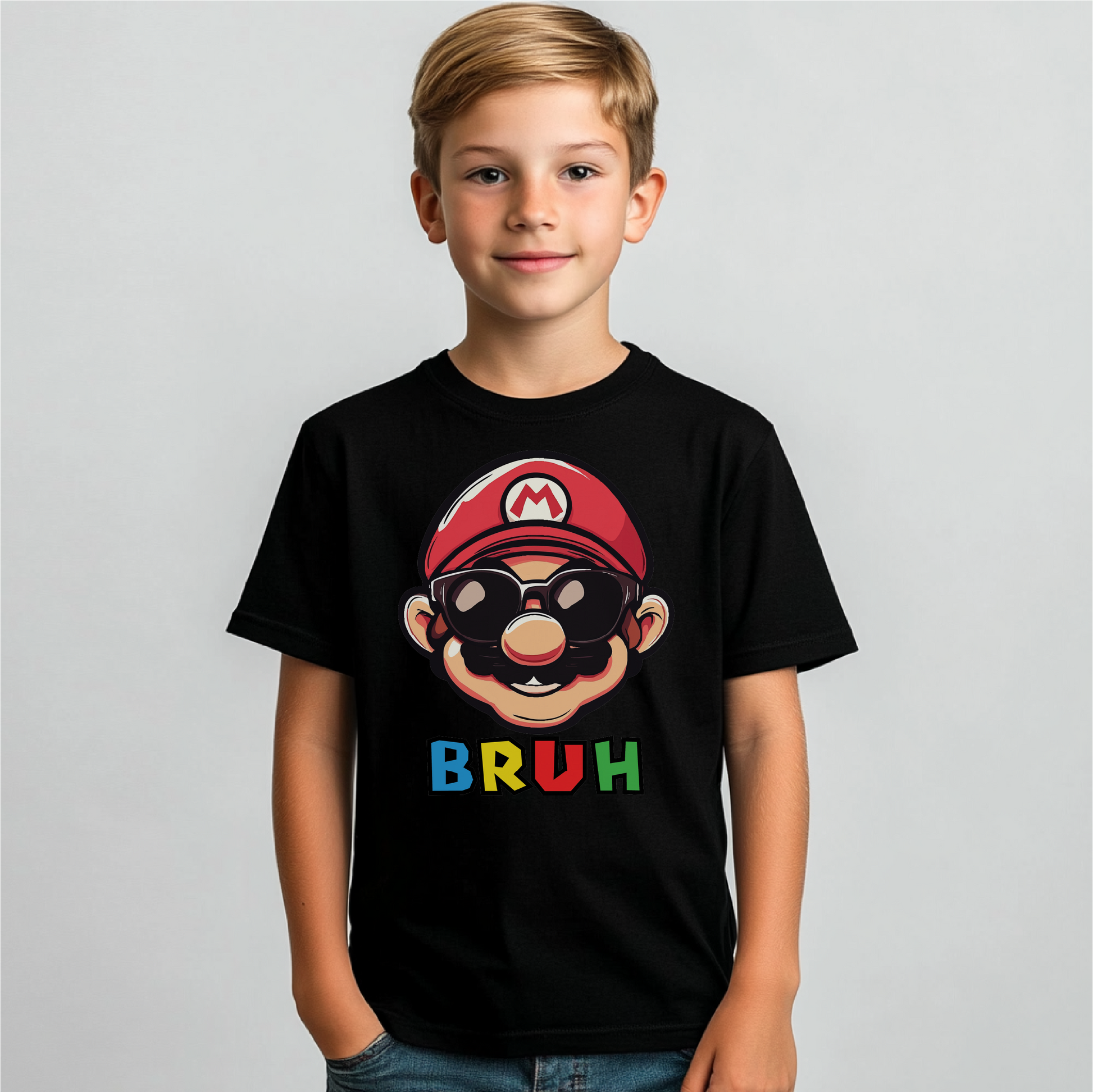 Super Bruh youth apparel featuring a retro-inspired character with sunglasses and vibrant 'BRUH' text. Available in toddler and youth sizes, shown on a black T-shirt.